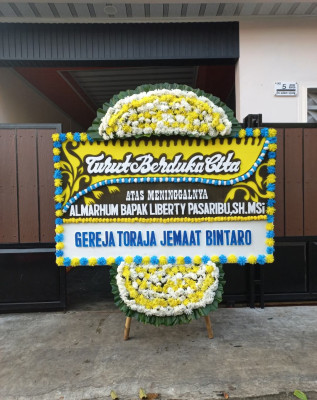 Papan Bunga Duka di Moyag Todulan